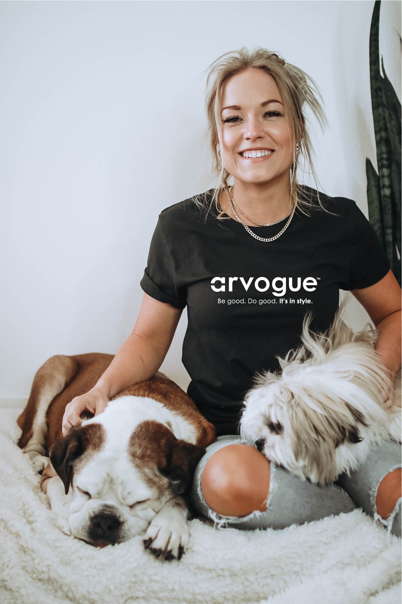 Woman with her two dogs woman is wearing a black ArvogueUltra Soft Women's T Shirt