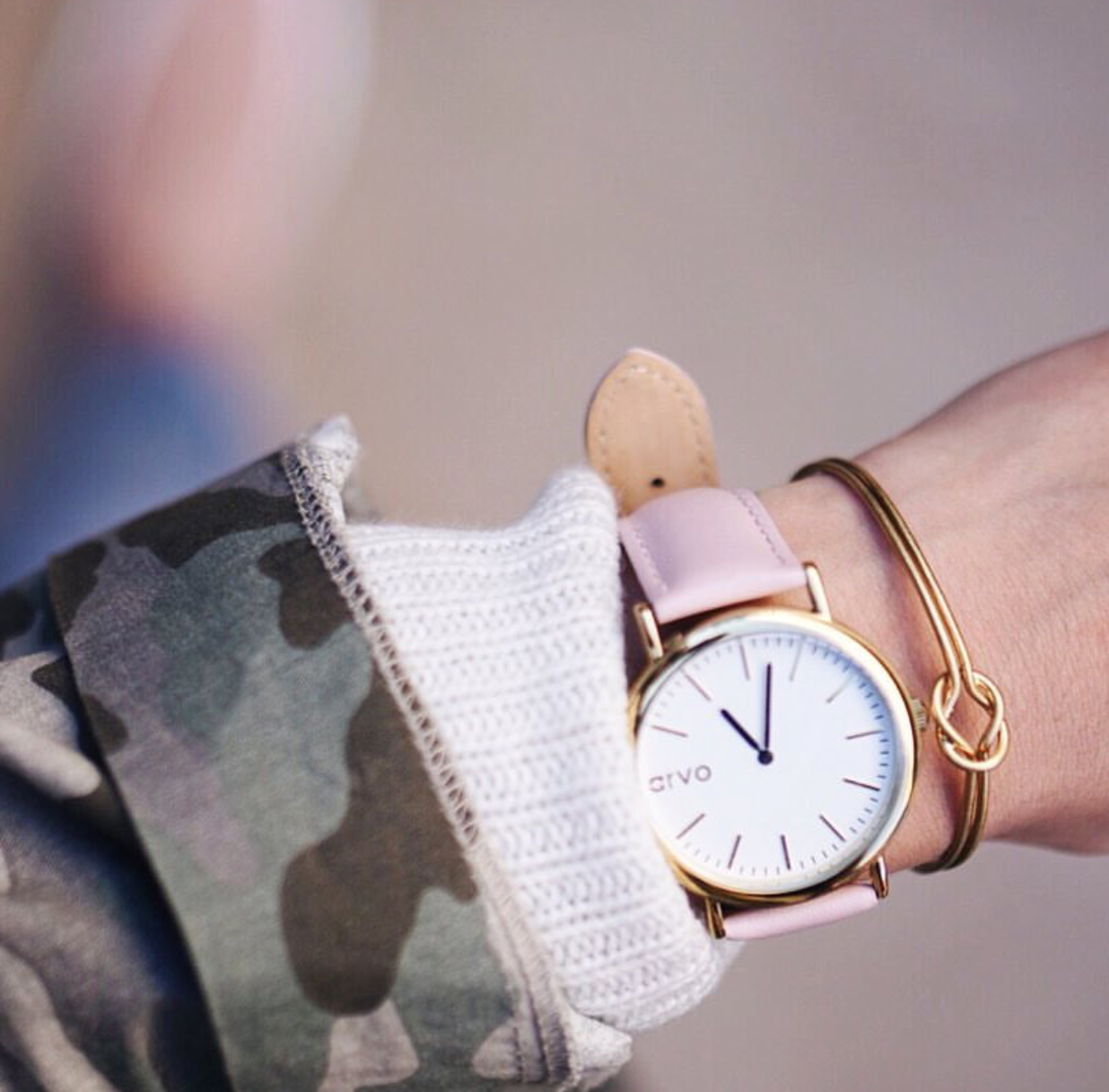 White Time Sawyer watch for women with a pink leather band on a woman's wrist