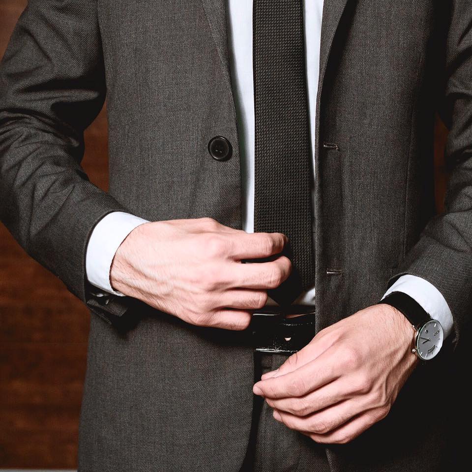 man in a gray suit wearing an Arvo Awristacrat silver with black leather classic watches for men and women