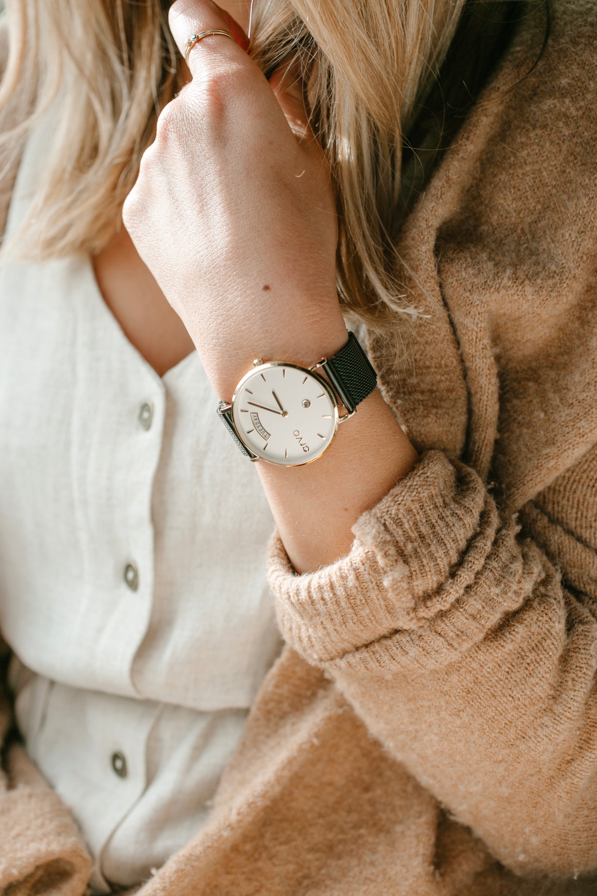 Woman wearing an Arvo Twilight two-tone watch for men and women