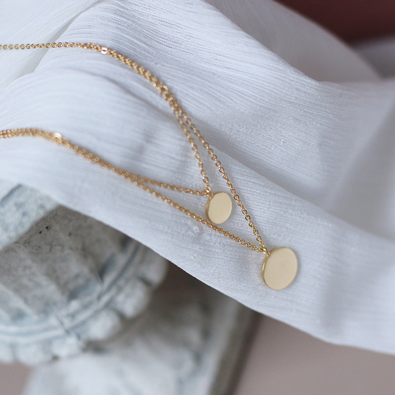 display of an Arvo Layered Double Disc Necklace