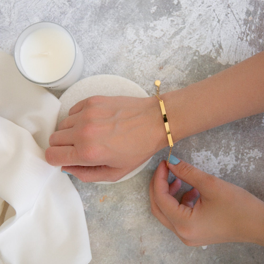 Arvo gold bar bracelet for women on a woman's wrist
