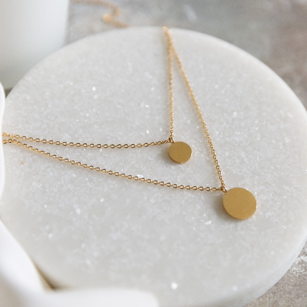 closeup of an Arvo Layered Double Disc Necklace